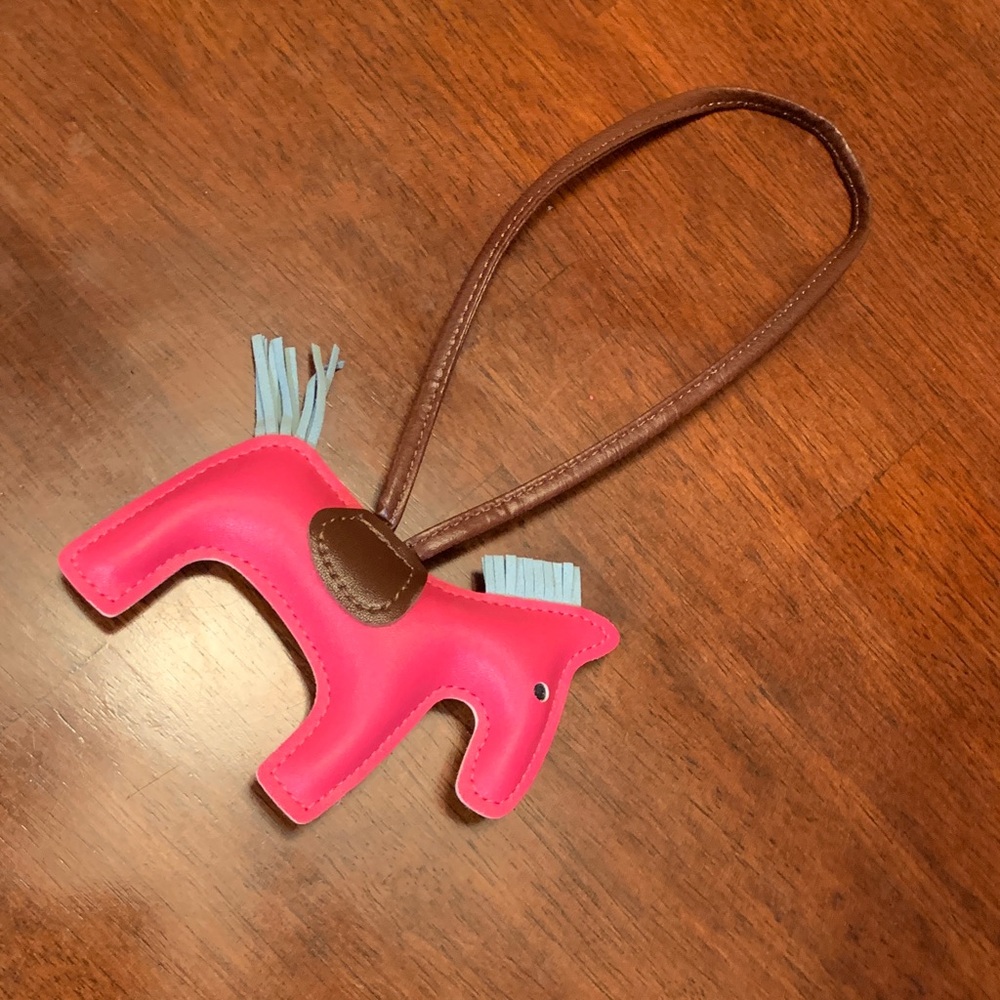 Brand new condition,trendy , fashionable pink horse 🐴 leather charm for purse.